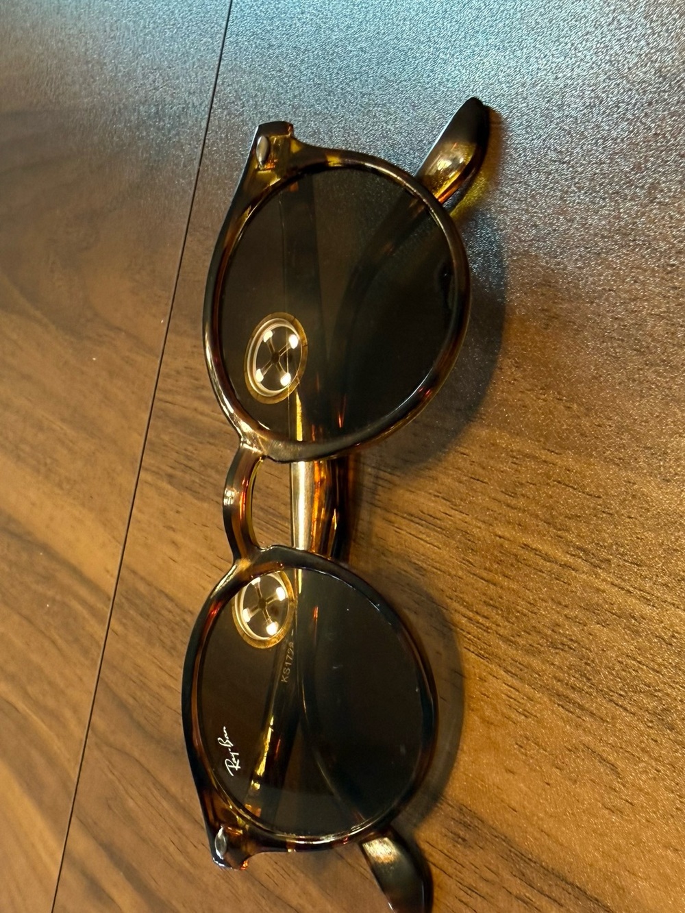 Ray-Ban Tortoiseshell Round Sunglasses with Dark Lenses